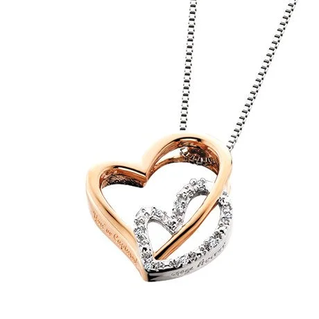 Double heart pendant is sterling silver with 18kt rose gold overlay and .025tw diamonds it is engraved with "You've Captured My Heart". Includes 18" sterling silver box chain.